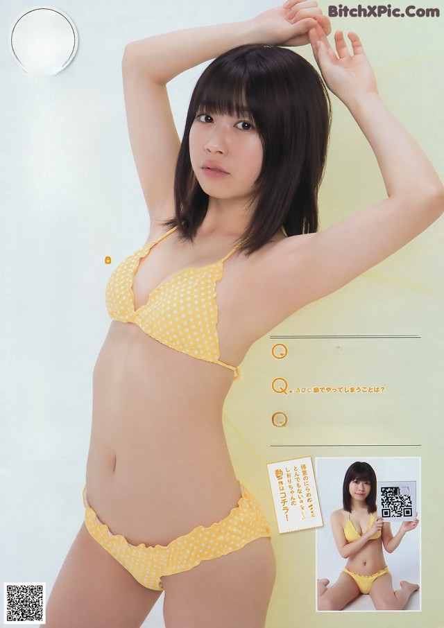 A woman in a yellow bikini posing for a magazine.